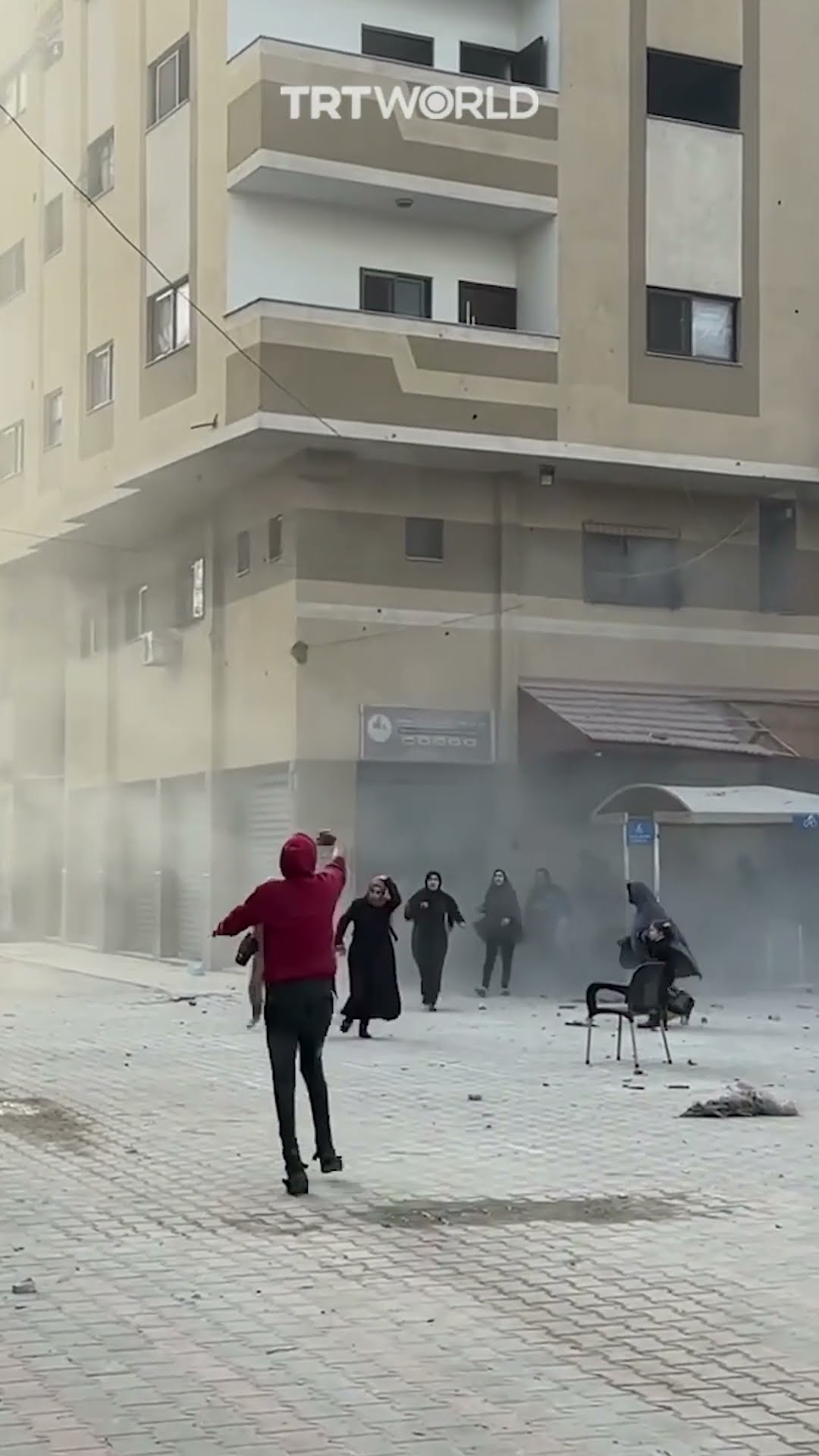The moment Israel hit a residential building in Gaza as Palestinians were fleeing