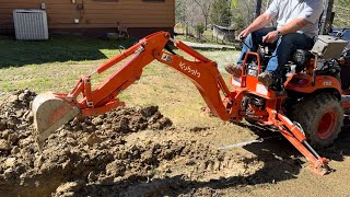 Kubota bx23s digging another French drain