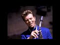 Thumbnail for David Bowie - Black Tie White Noise (Official Music Video) [HD Upgrade]