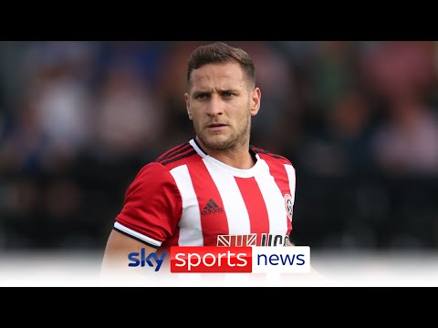 Man arrested after Sheffield United captain Billy Sharp attacked during pitch invasion