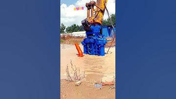 The image shows an excavator (a Sumitomo machine) 🚜 with a specialized attachment mounted🔥.