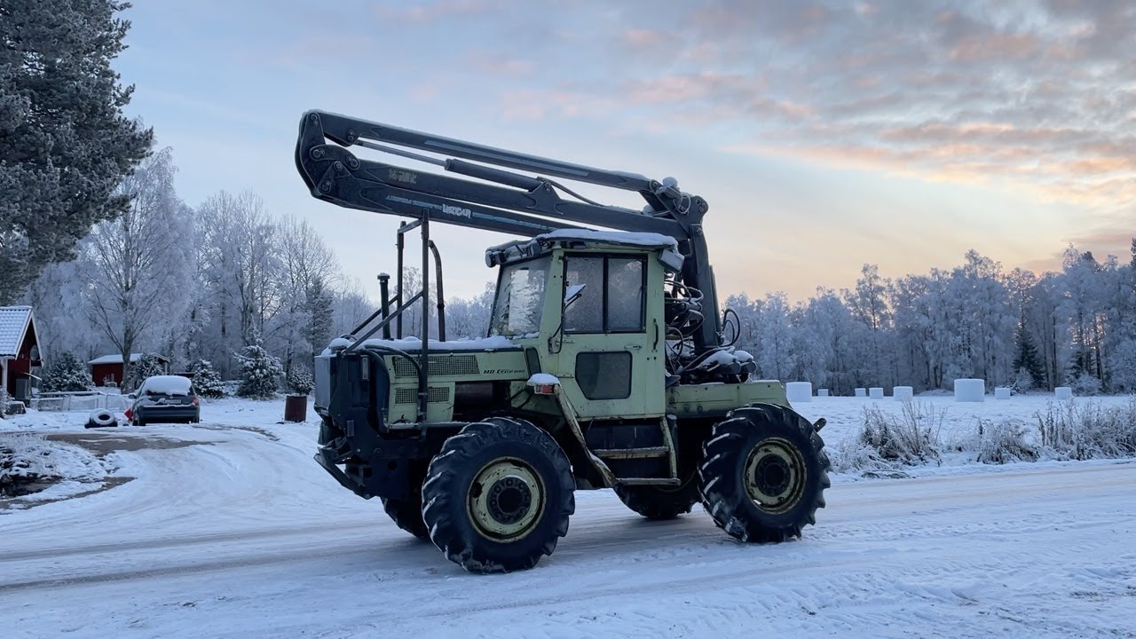 Köp Traktor MB Trac 800 med Mowi kran på Klaravik
