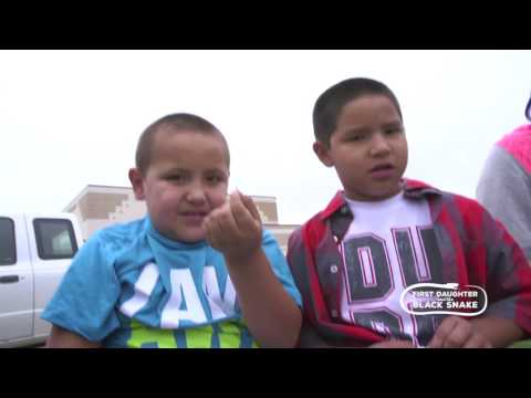 Pine Point School Kids Parching Wild Rice