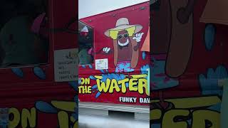 Floating Food Truck Serves Hot Dogs On A Michigan Lake Sandbar