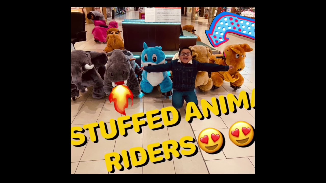 Kids Animal Scooters At The Mall Riding Stuffed Animal Through Mall