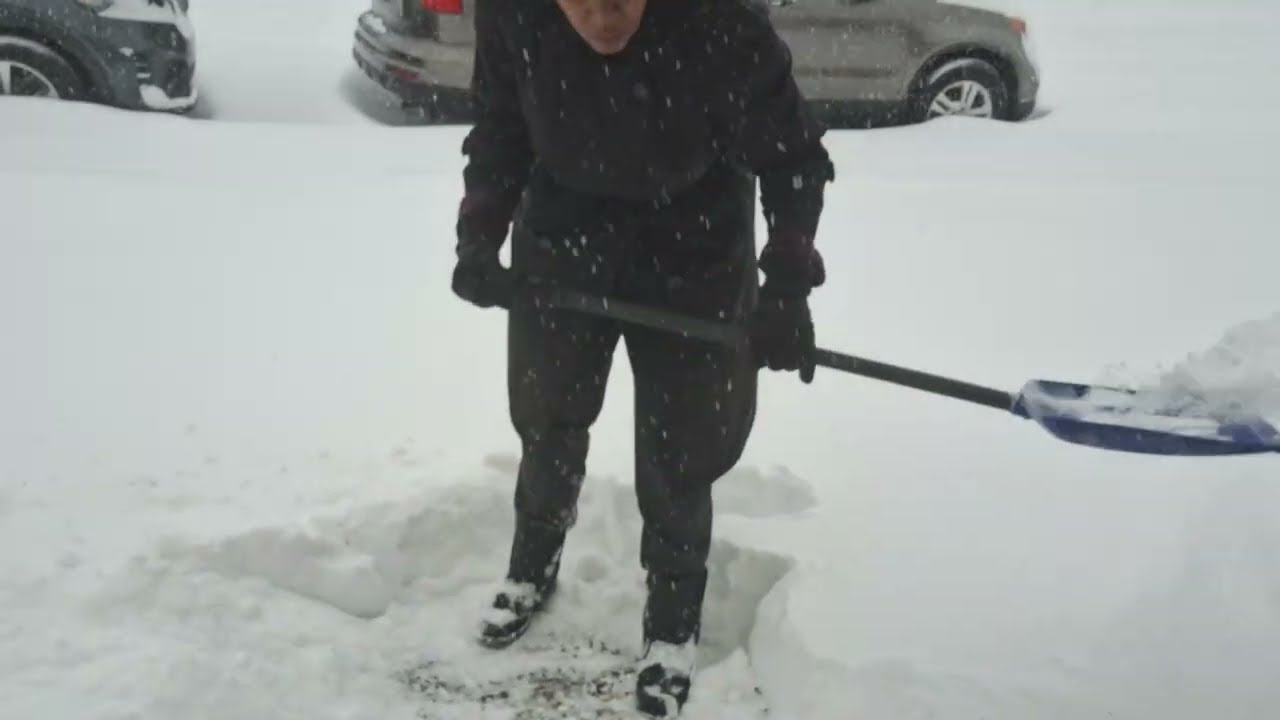Outside trying to shovel some of this snow up