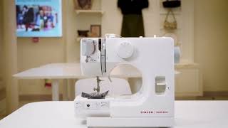 SINGER TAILORMATE, A lightweight tabletop electric straight-stitch machine