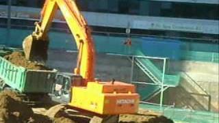 Hitachi Zaxis 450 LC-3 loading Mercedes Actros
