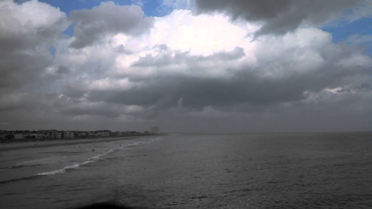 Pelicans flying over the Surfside Beach Pier YouTube