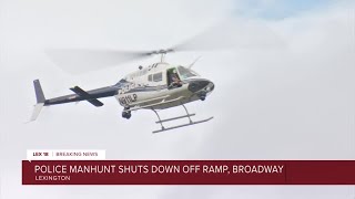 Police manhunt shuts down off ramp. Broadway