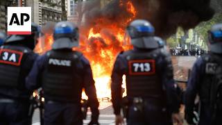 Students in France set trash bins ablaze during protest over school funding Update