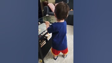 Thumbnail of Omar playing piano cutie baby