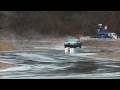 Vaughn Gittin Jr. drifting the 2010 Mustang in the rain at the YZ circuit