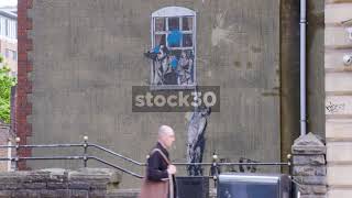 Banksy's Well Hung Lover Street Art In Bristol, UK