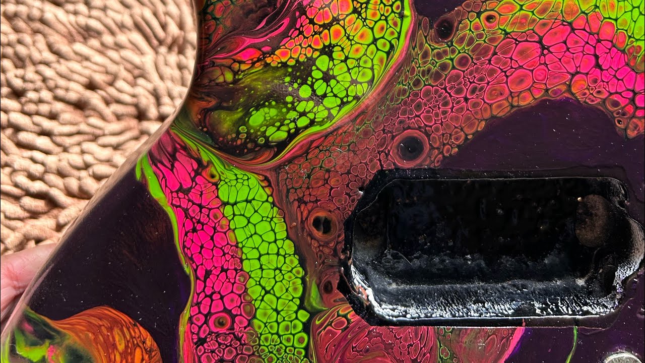 What a challenge! Paint pour over a guitar, you’ve got check out how gorgeous this turns out.