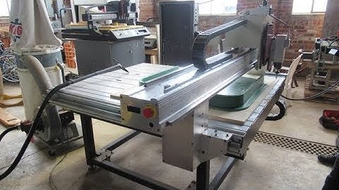 AXYZ 4004 CNC ROUTER CUTTING FIBERGLASS
