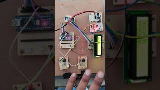 bi-directional visitors counter and display system with max capacity alarm.