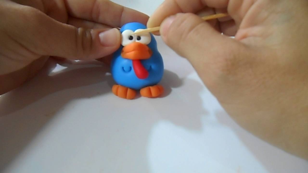 CHAVEIRO GALINHA PINTADINHA EM BISCUIT