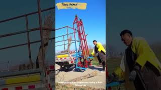 Loading Bundled Sugarcane Using a Belt Driven Lift