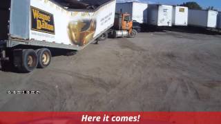 Semi trailer collapse and splits in half.  Tractor-trailer splits in half after being unloaded.