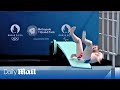 Embarrassing moment French diver slips during Olympic inauguration ceremony attended by Macron