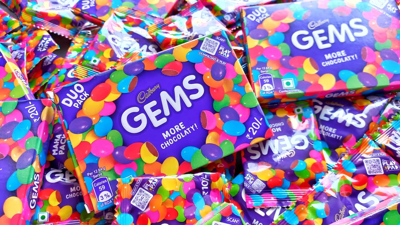 100 candies opening, chocolate a video, lots of chocolates, Cadbury celebration, surprise toys