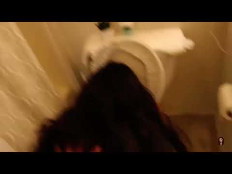 Black Hair Girl Vomiting Up In The Toilet