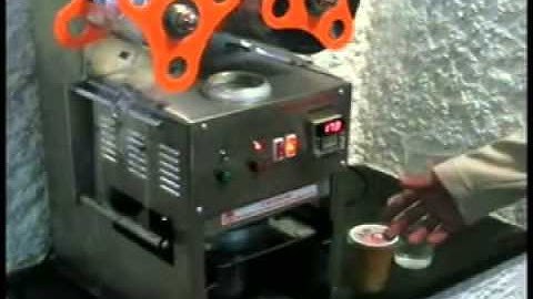 Máy dập nắp cốc trà sữa tự động bằng inox , máy dán nắp ly, máy hàn miệng ly nước mía, đồ uống