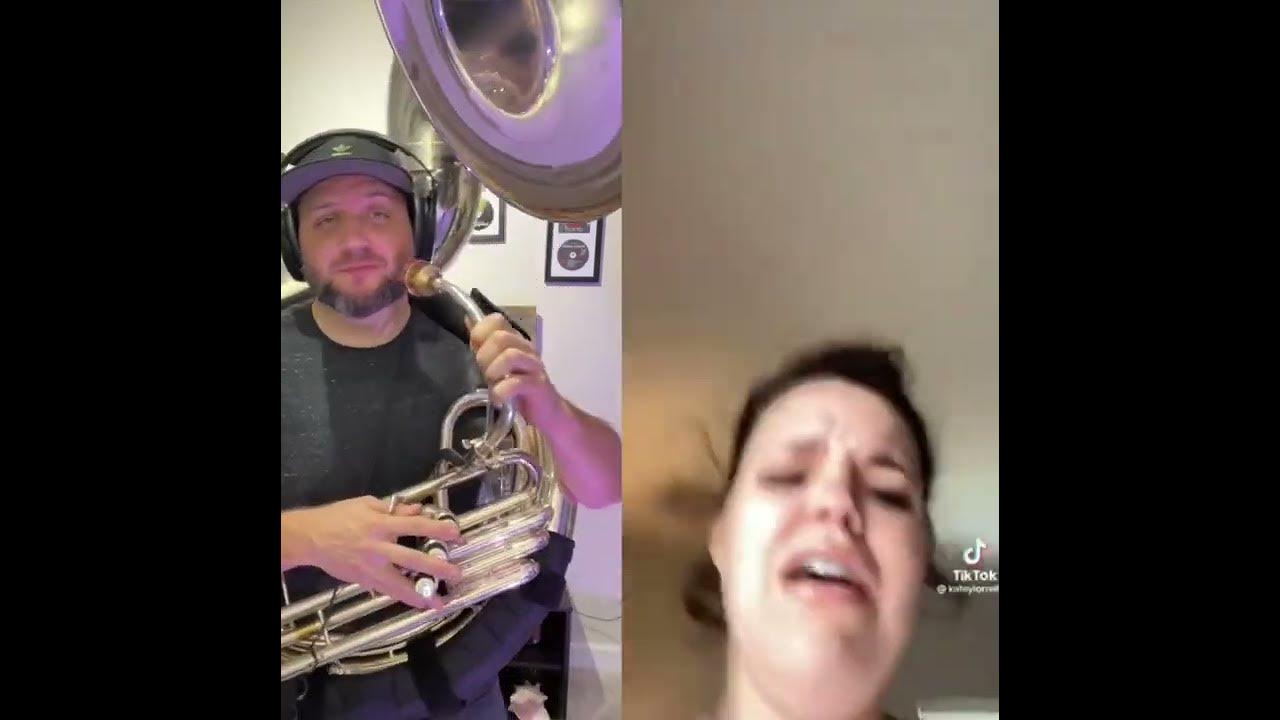 TikTok woman falling / sousaphone YouTube