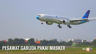 Pesawat Garuda Indonesia Pakai Masker Landing dan Take Off di Bandara Soekarno-Hatta Jakarta