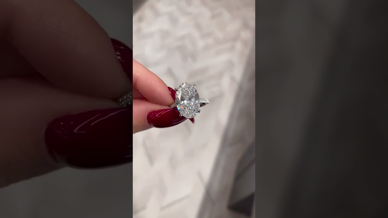 6 carat Oval Diamond Signature Wrap Ring