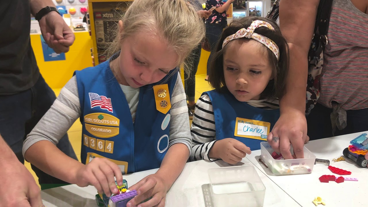 Girl Scouts build and test roller coaster cars with the LEGO Group