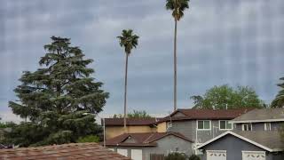 Mostly Cloudy & Breezy West To WNW Winds 6:14om March 27, 2022