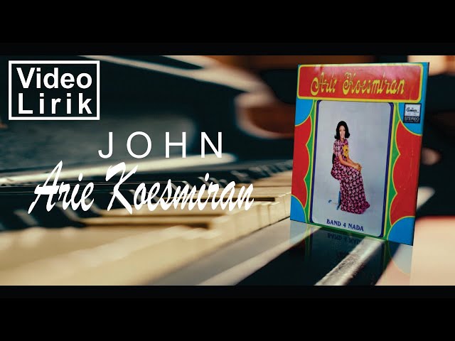 Arie Koesmiran John | Video Lirik class=