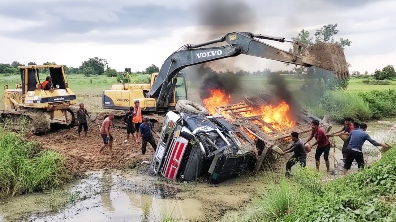 Wow!! Skilled Recovery 😲 Overturned Dump Truck Rescued from Canal by Excavator & Bulldozer