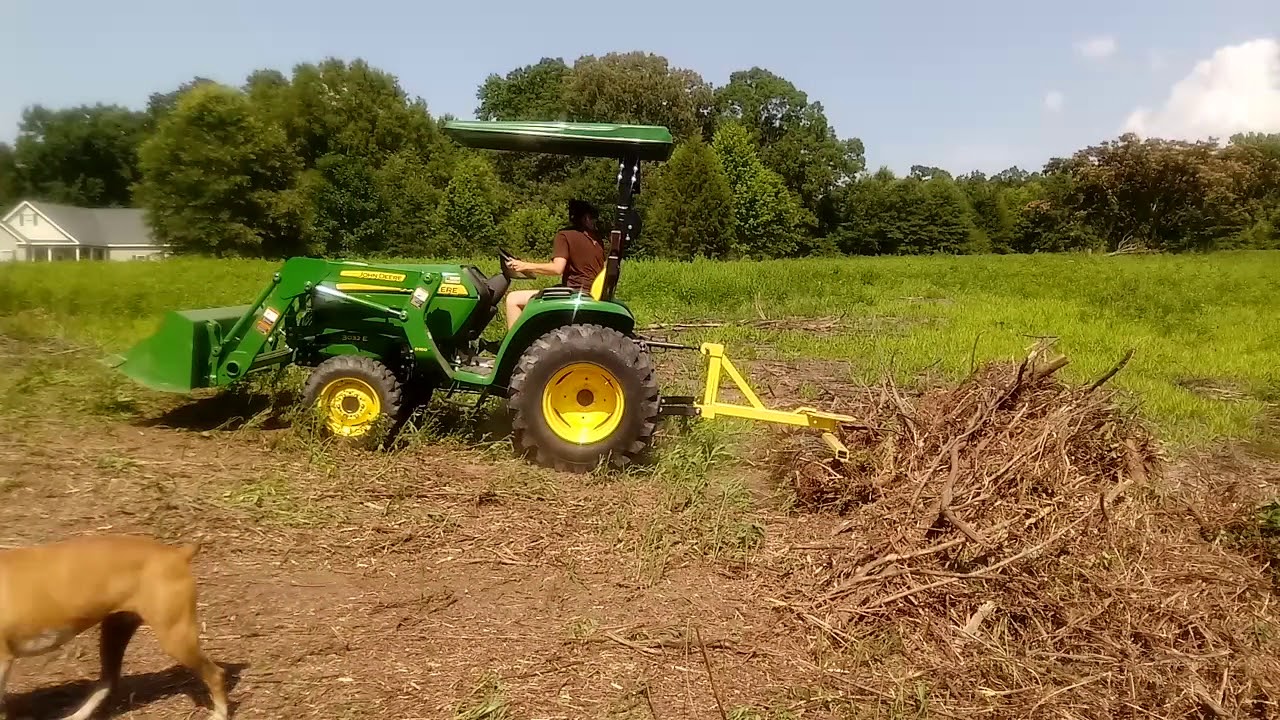 Landscape rake attachment on john deere tractor - YouTube