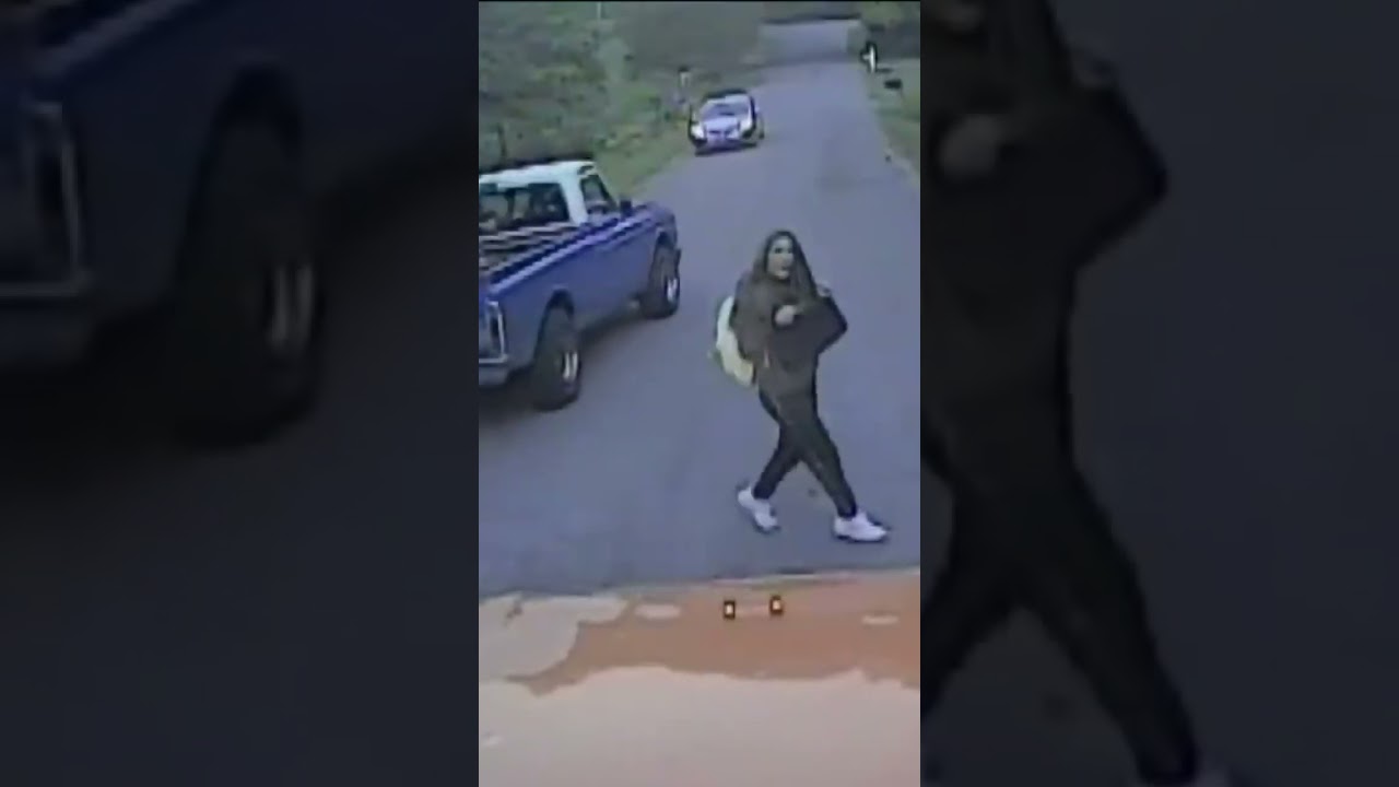 Video shows girl’s frightening brush with truck running school bus stop sign