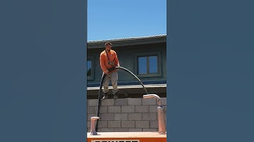 Reinert XR536 Grout Pumping into a Masonry Block Wall.