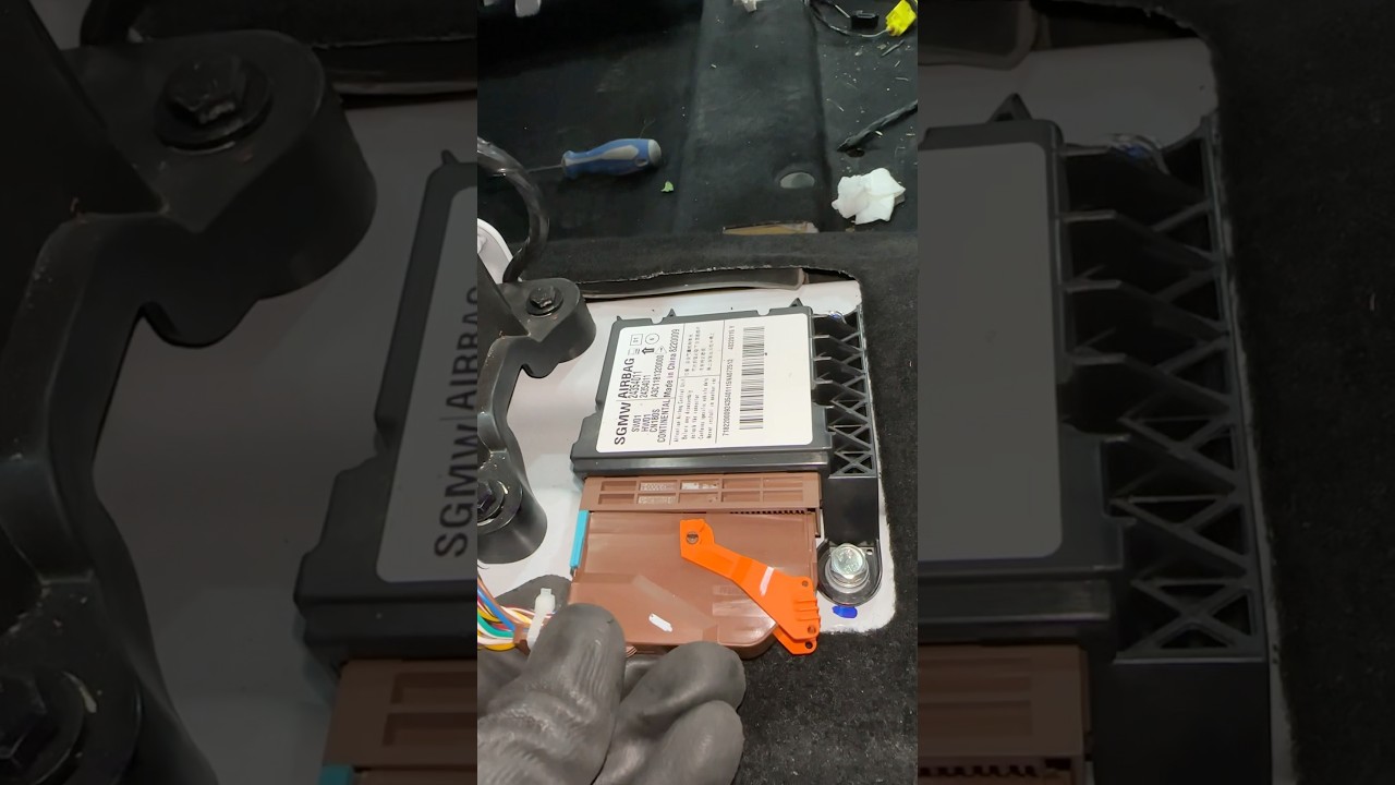 How to replace airbags control module #airbag #module #shorts - YouTube