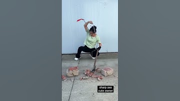 A cute lady holding a sharp axe #shorts #axe #cute