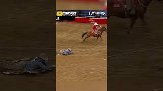 WILD Cowboys dragging across the dirt at a rodeo. cowboy horse rodeo