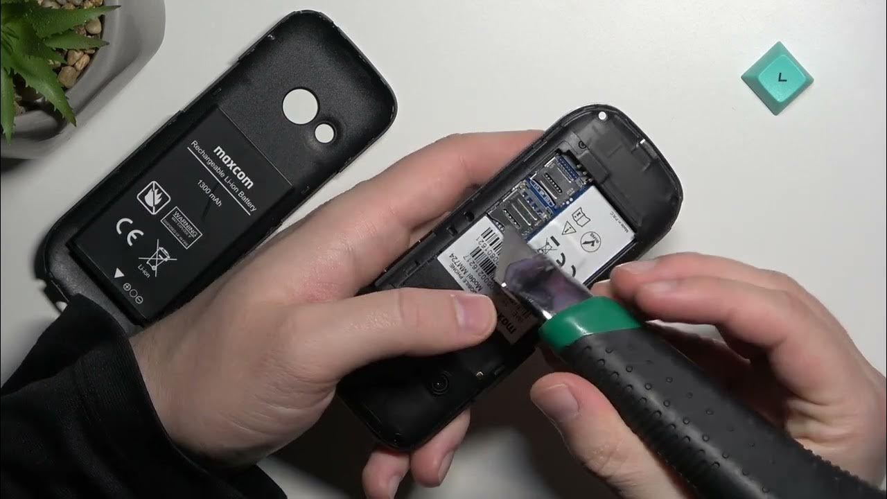 How to Input SIM Card into MAXCOM MM724 Phone? - YouTube