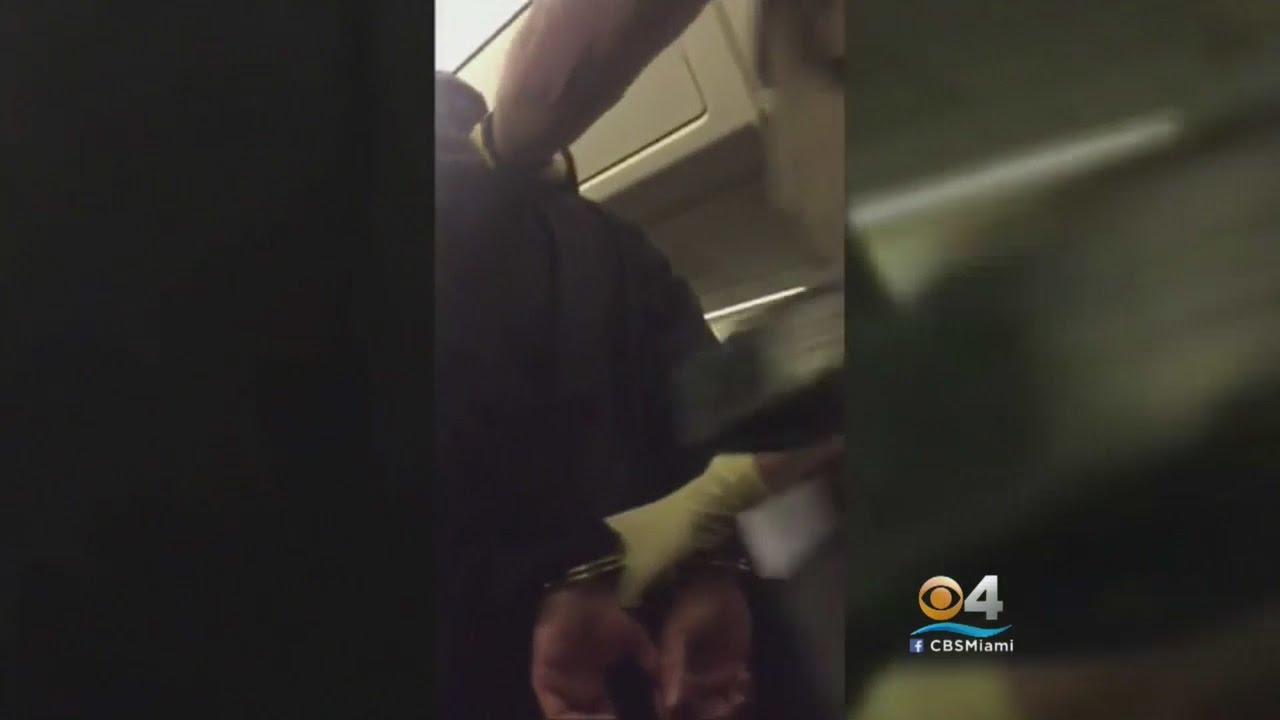 Exclusive: Man Arrested For Reportedly Pushing Attendant On Flight To MIA