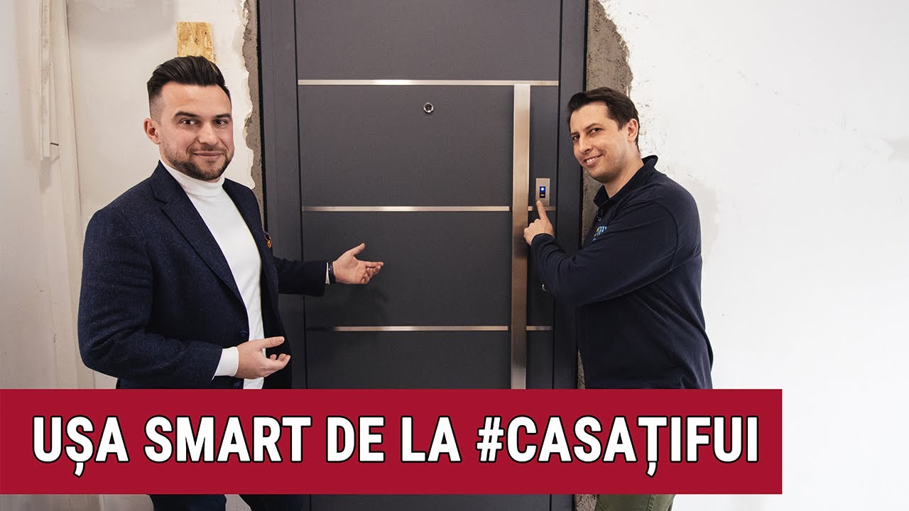 Ușă de intrare METGLASS motorizată, cu acces pe amprentă, într-o casă modernă