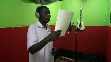 John De'Mathew in studio recording Uhuru Kenyatta song