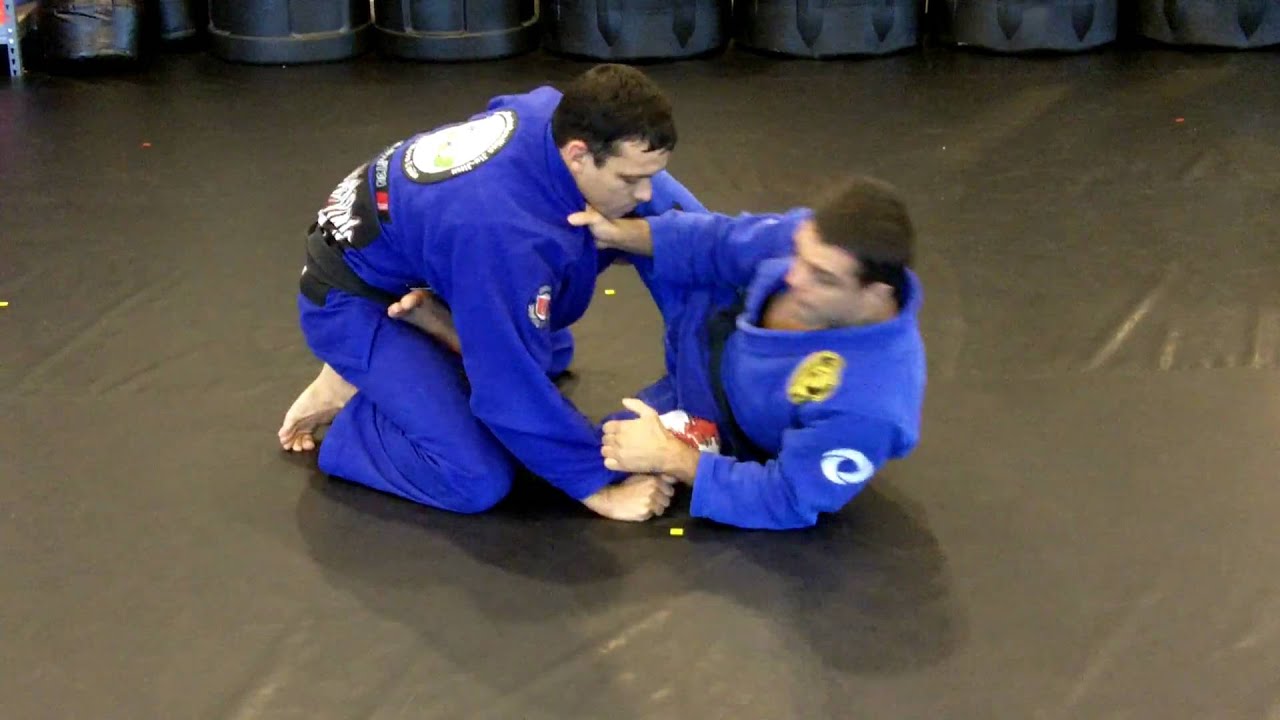 Robson Moura and Gustavo Dantas Show a Loop Choke from Open Guard