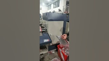 Drawstring garbage bag making machine