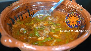 Carne De Puerco En Salsa Tatemada Y Nopales Asados