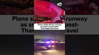 Plane skids off icy runway as snow snarls post-Thanksgiving travel