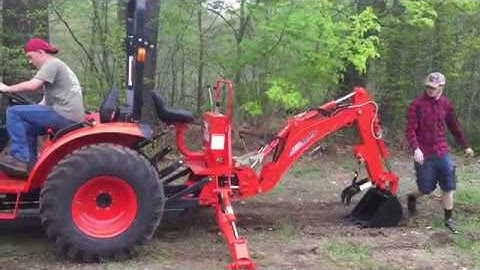 How to take off a Kioti Tractor Backhoe - CK2610 HST w/ KB2475L Backhoe